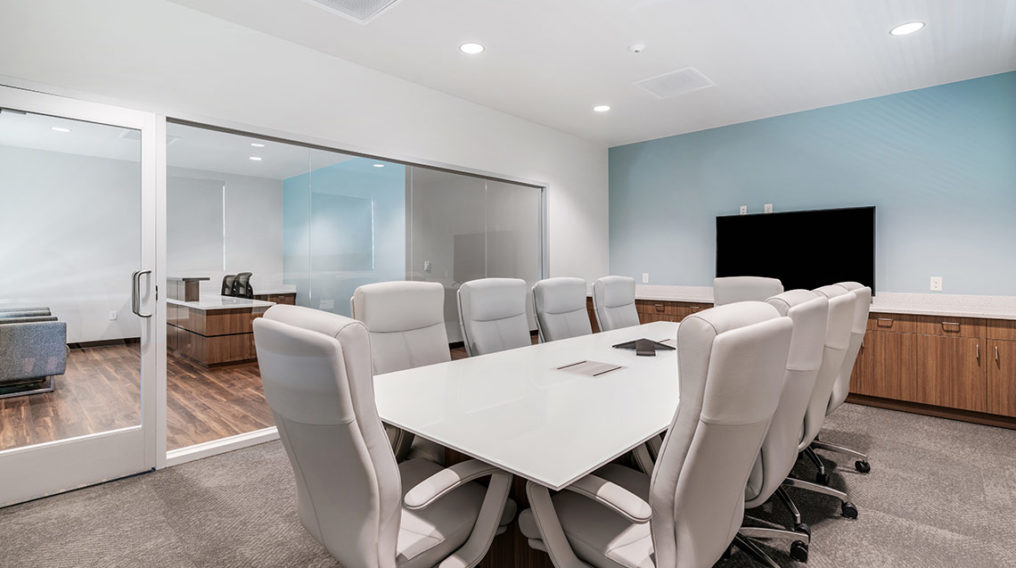 conference table with grey chairs